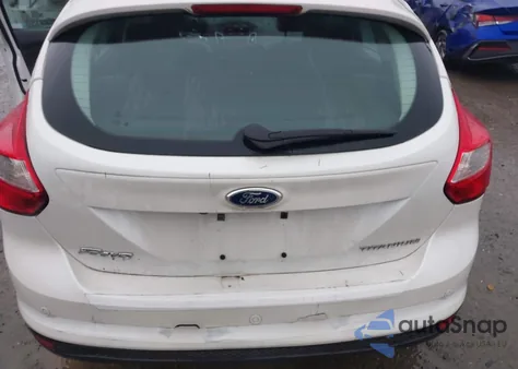 2014 Ford Focus Titanium from USA, damaged, VIN 1FADP3N25EL375578